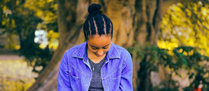 woman writing in a journal
