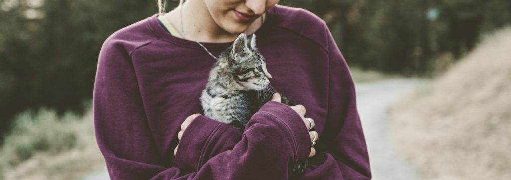 girl and pet cat