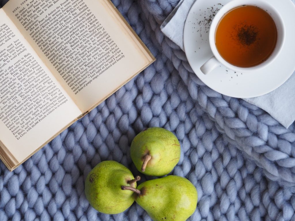 3 green pears and a book and a cup of tea