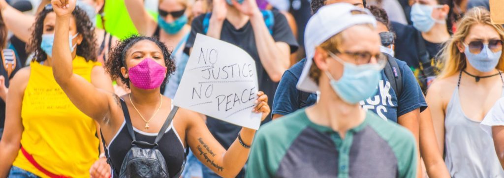 A crowd of people protesting
